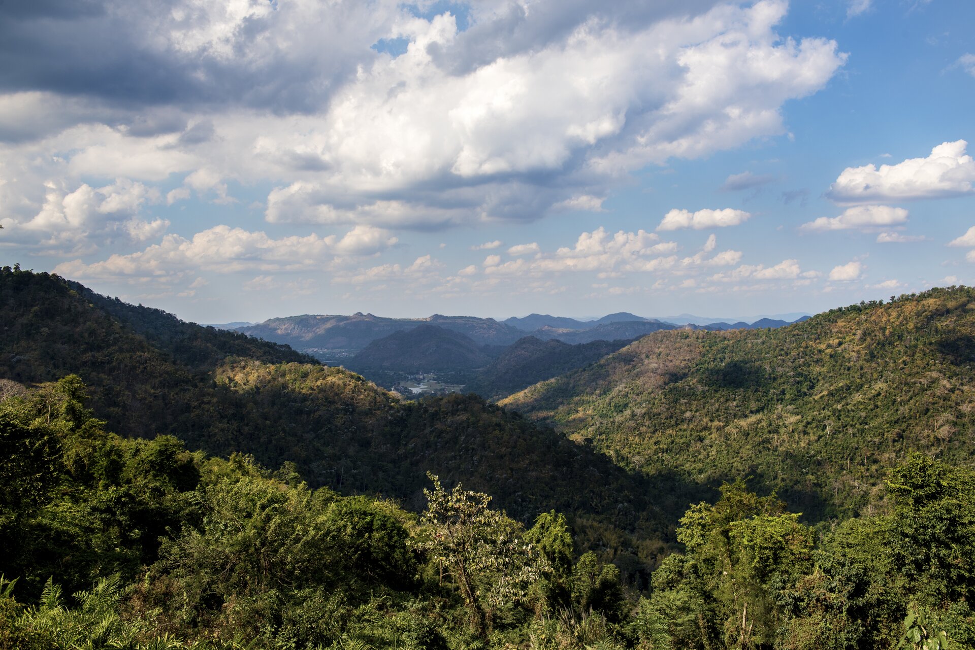Mountain landscape with cloudy blue sky